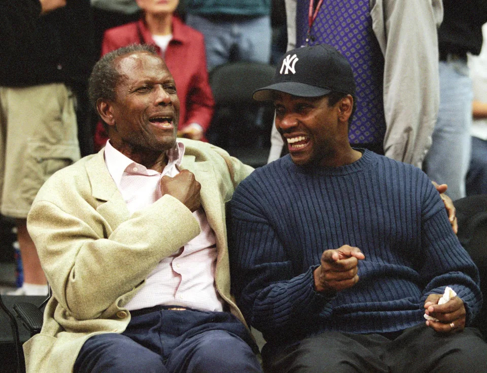 Sidney Poitier and Denzel Washington (Photo by Kevin Reece/WireImage)