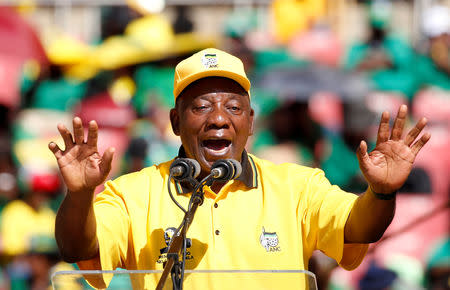 FILE PHOTO: President of South Africa's governing African National Congress Cyril Ramaphosa waves to his supporters, as he arrives for the party's final rally at Ellis Park Stadium in Johannesburg, South Africa, May 5, 2019. REUTERS/Siphiwe Sibeko/File Photo