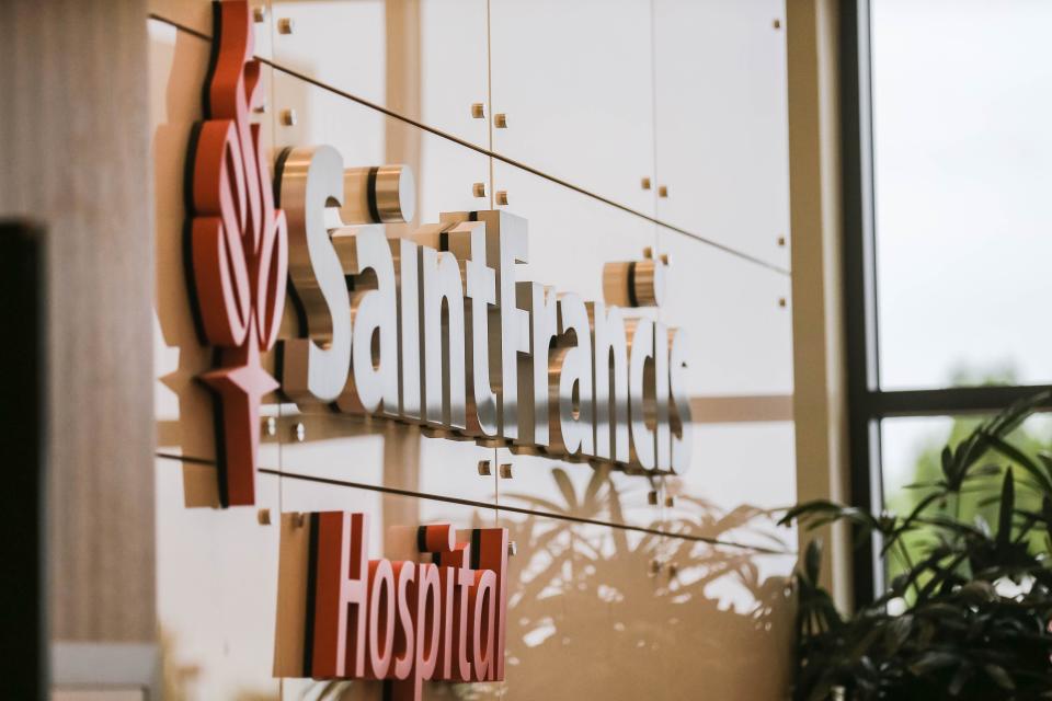 A Saint Francis Hospital sign is pictured June 2 at a news conference, a day after a gunman entered a medical facility and killed four on the  Saint Francis Health System campus in Tulsa.