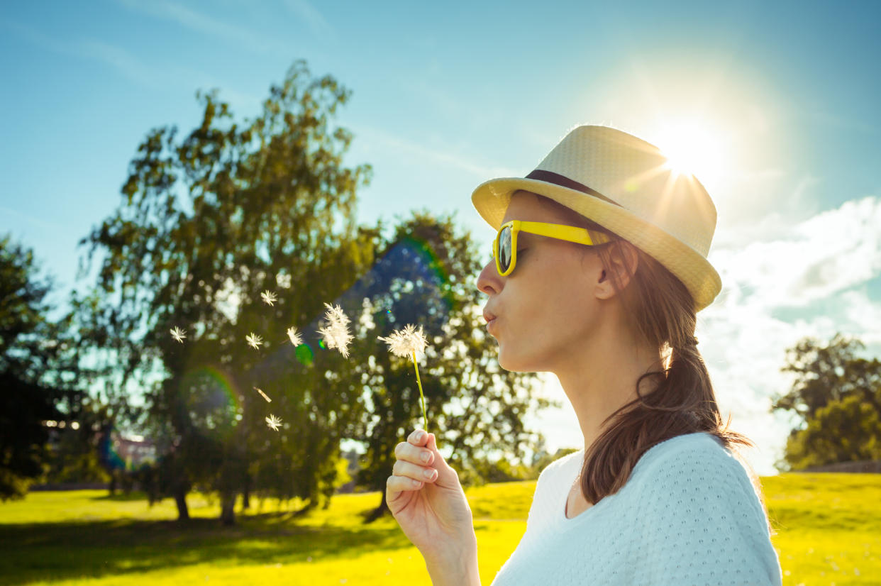 Woman enjoying the summer sunshine. (Getty Images)