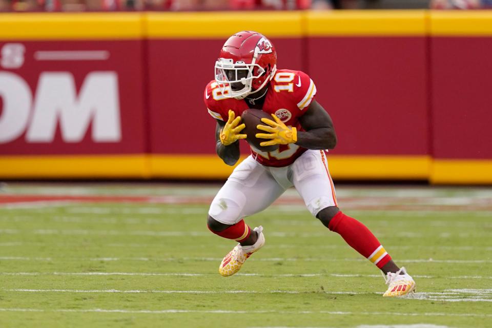 Kansas City Chiefs wide receiver Tyreek Hill catches a 75-yard touchdown pass during the second half of an NFL football game against the Cleveland Browns Sunday, Sept. 12, 2021, in Kansas City, Mo. (AP Photo/Charlie Riedel)