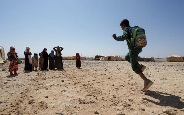FILE PHOTO: Children play at a camp for IDPs in Marib