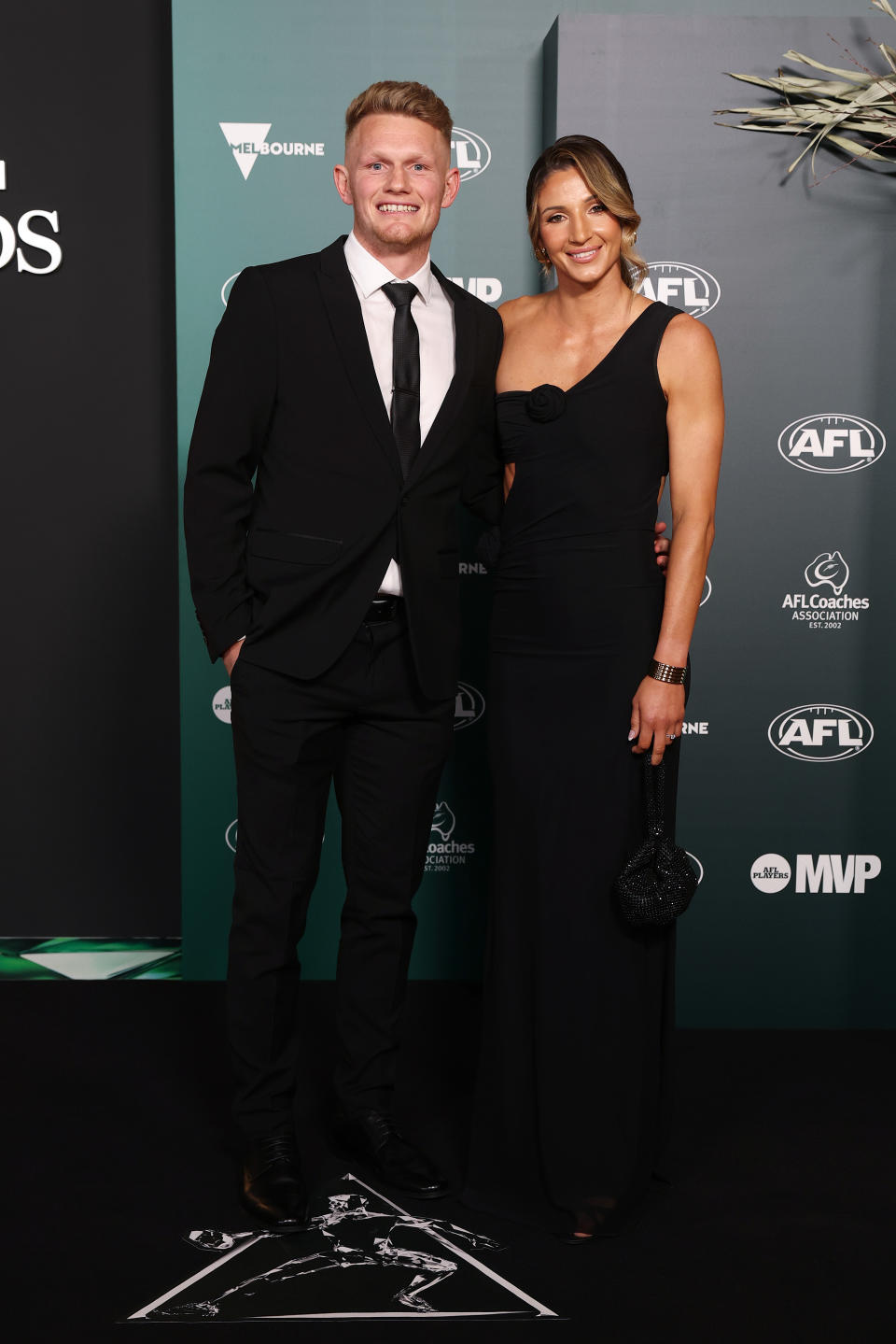 Adam Treloar and guest arrive ahead of the 2024 AFL Awards