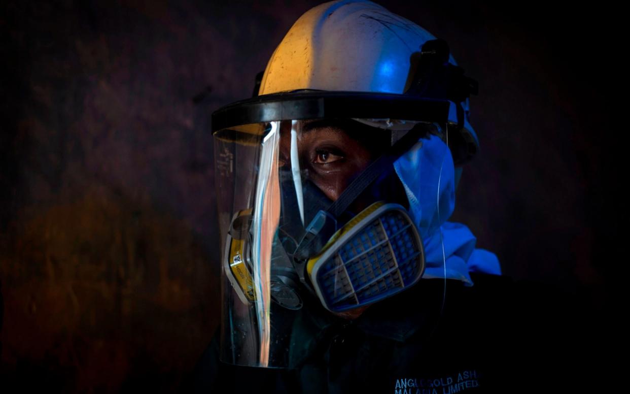 A worker pictured during insecticide spraying in Adansi Domeabra, Ghana - Christina Aldehuela/AFP