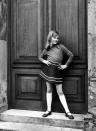 <p>A photo from a private family album shows Diana posing cheekily as a young girl. Obviously a natural in front of the camera, she also had a keen sense of style from an early age.</p>