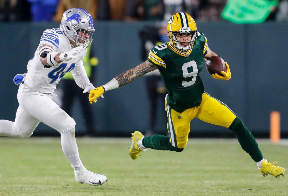 Green Bay Packers wide receiver Christian Watson (9) runs past <a class="link " href="https://sports.yahoo.com/nfl/teams/detroit/" data-i13n="sec:content-canvas;subsec:anchor_text;elm:context_link" data-ylk="slk:Detroit Lions;sec:content-canvas;subsec:anchor_text;elm:context_link;itc:0">Detroit Lions</a> linebacker <a class="link " href="https://sports.yahoo.com/nfl/players/34144" data-i13n="sec:content-canvas;subsec:anchor_text;elm:context_link" data-ylk="slk:Malcolm Rodriguez;sec:content-canvas;subsec:anchor_text;elm:context_link;itc:0">Malcolm Rodriguez</a>.<br>Nfl Detroit Lions At Green Bay Packers