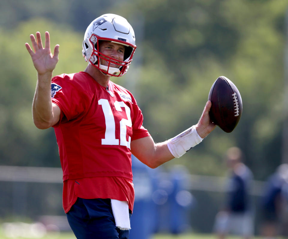 FOXBOROUGH, MA - AUGUST 2: New England Patriots quarterback Tom Brady waves to the crowd during drills at New England Patriots Training Camp at Gillette Stadium in Foxborough, MA on Aug. 2, 2019. (Photo by Jonathan Wiggs/The Boston Globe via Getty Images)