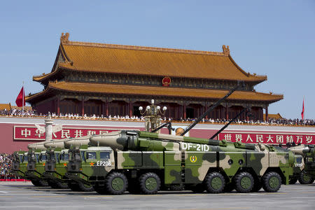 Chinese military vehicles carrying DF-21D anti-ship ballistic missiles travel past Tiananmen Gate during a military parade to commemorate the 70th anniversary of the end of World War II in Beijing Thursday Sept. 3, 2015. Andy Wong/Pool via REUTERS/Files