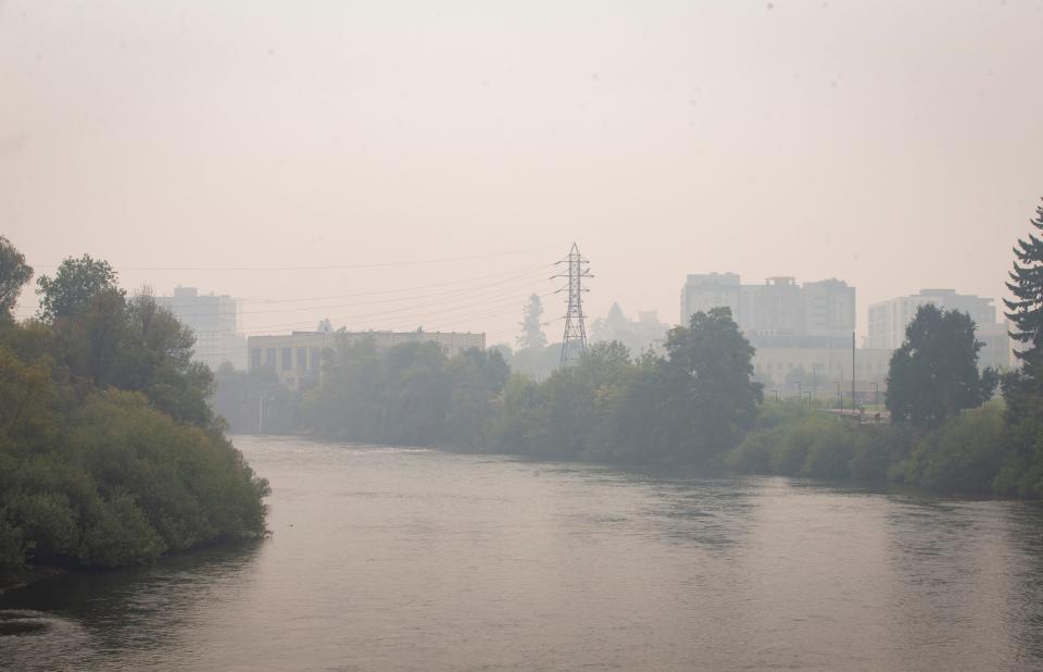 Smoky air hangs over the Willamette River near the DeFazio Bridge Tuesday.