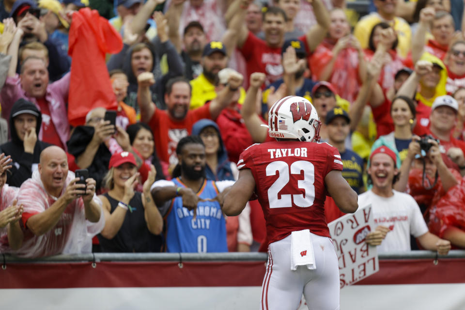 Wisconsin running back Jonathan Taylor celebrates a touchdown against Michigan during the first half of an NCAA college football game Saturday, Sept. 21, 2019, in Madison, Wis. (AP Photo/Andy Manis)