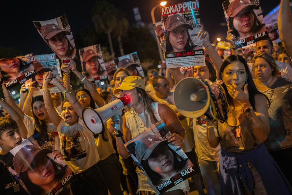 Relatives and friends of people kidnapped during the Oct. 7 Hamas cross-border attack in Israel, demonstrate during a protest calling for the return of the hostages, in Tel Aviv, Israel, Saturday, Nov. 4, 2023. (AP Photo/Bernat Armangue)