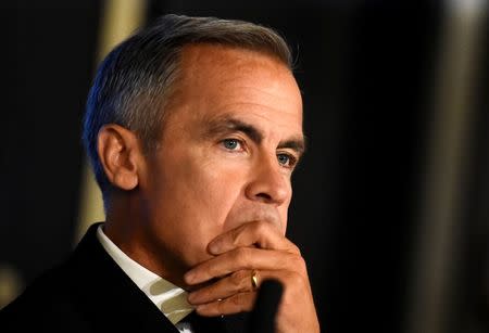 FILE PHOTO: Mark Carney, the Governor of the Bank of England, attends an event in Dublin, Ireland, September 14, 2018. REUTERS/Clodagh Kilcoyne/File Photo