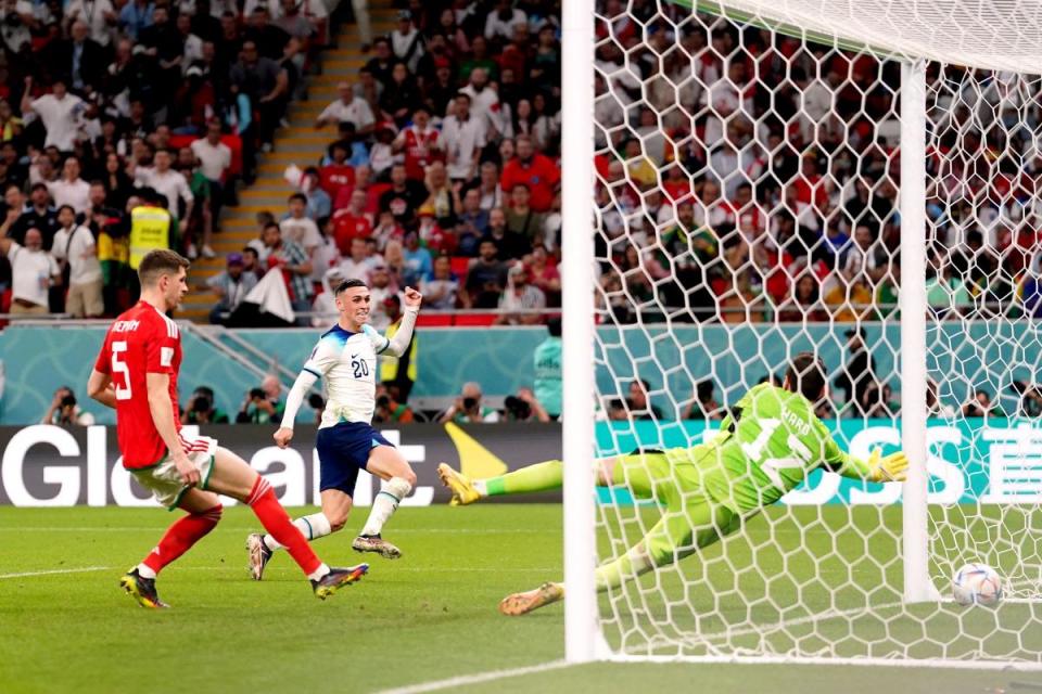 DESPAIR: Phil Foden slots England's second goal against Wales <i>(Image: PA)</i>