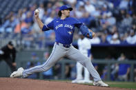 Toronto Blue Jays starting pitcher Kevin Gausman throws during the first inning of a baseball game against the Kansas City Royals Tuesday, April 23, 2024, in Kansas City, Mo. (AP Photo/Charlie Riedel)