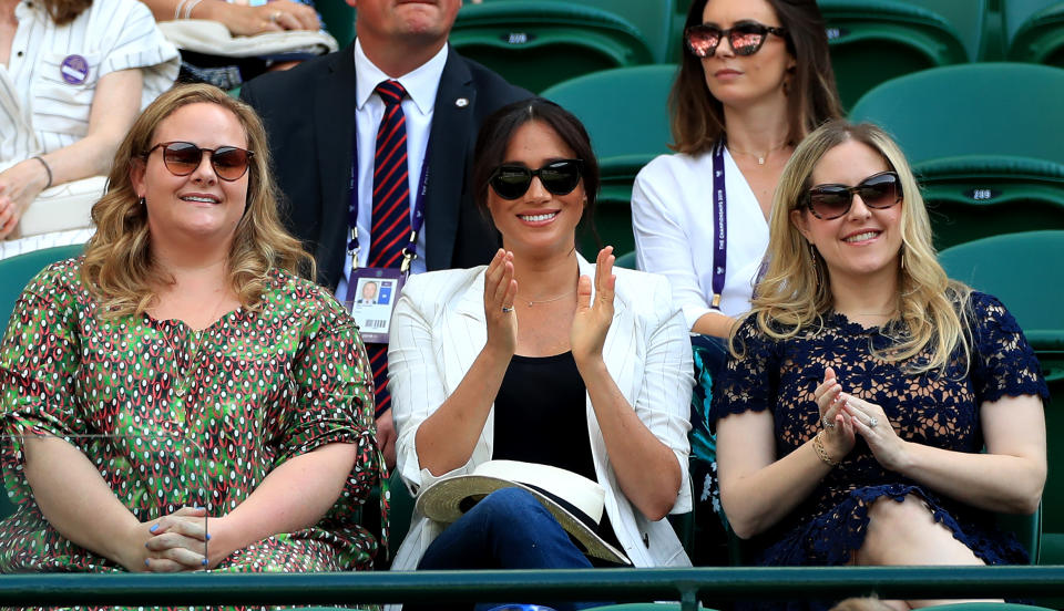 Duchess of Sussex watches Serena Williams on court one on day four of the Wimbledon Championships at the All England Lawn Tennis and Croquet Club, Wimbledon.