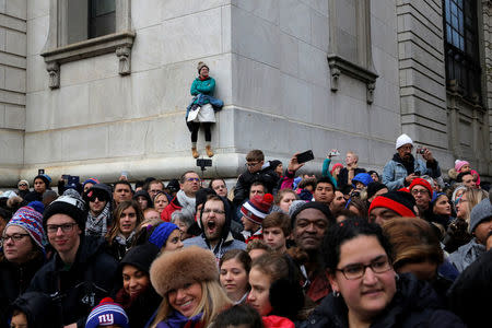 People line Central Park West to watch the 90th Macy's Thanksgiving Day Parade in Manhattan, New York, U.S., November 24, 2016. REUTERS/Andrew Kelly