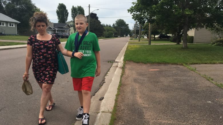 After brain blood clots and multiple fractures, mother of 11-year-old struck by car speaks out