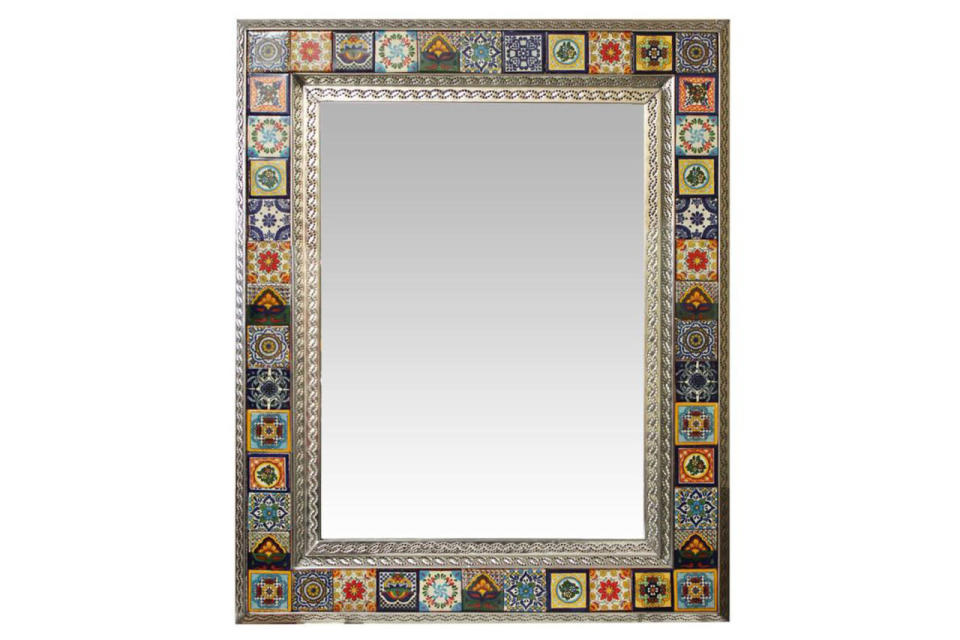 This classic Mexican tile and tin mirror is truly statement-making. 