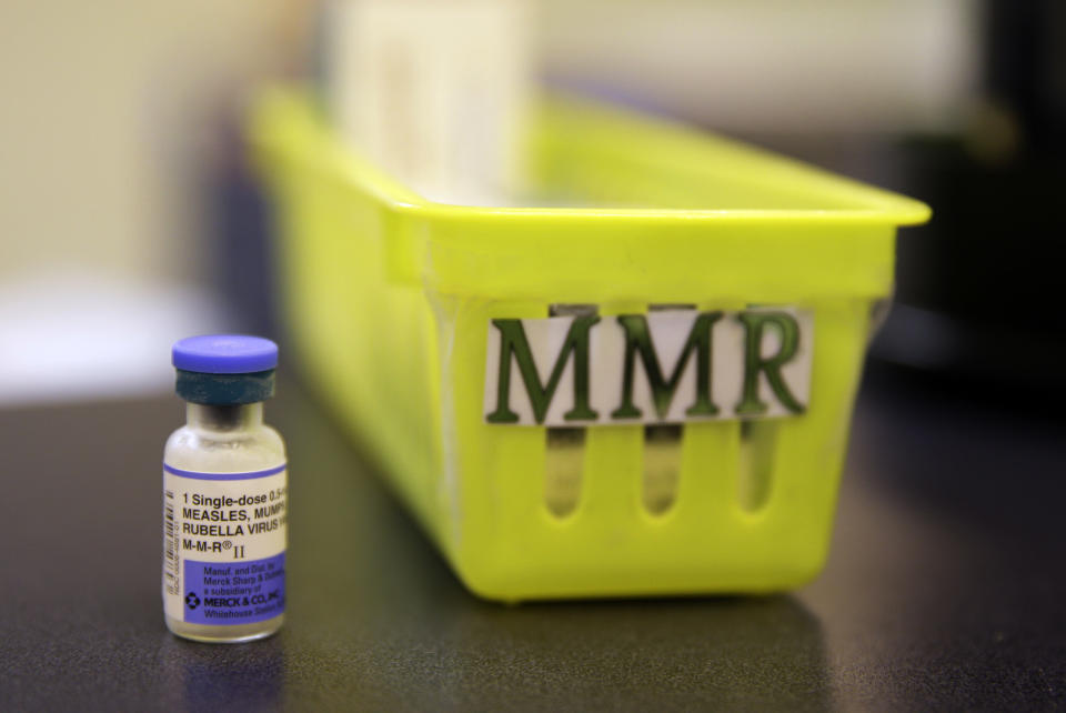 FILE - This Feb. 6, 2015, file photo, shows a measles, mumps and rubella vaccine on a countertop at a pediatrics clinic in Greenbrae, Calif. Washington state lawmakers voted Tuesday, April 23, 2019 to remove parents' ability to claim a personal or philosophical exemption from vaccinating their children for measles, although medical and religious exemptions will remain. (AP Photo/Eric Risberg, File)