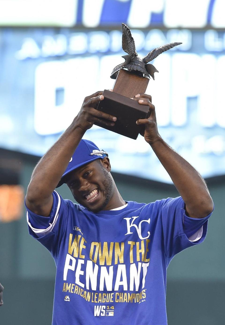 Kansas City Royals center fielder Lorenzo Cain hoisted the ALCS MVP trophy after the Royals beat the Orioles at the ALCS playoff baseball game on October 15, 2014 at Kauffman Stadium in Kansas City, MO. The Royals defeated the Orioles 2-1 to win the ALCS.