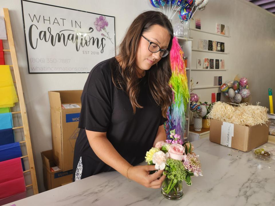 What in Carnations flower shop owner Kirby Pantoja prepares bouquets ahead of Mother's Day, their busiest week of the year.