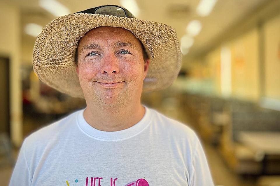 Ryan Crane of Galesburg can be seen most days walking around town, picking up trash along the way and stopping to spread joy to people along the way.