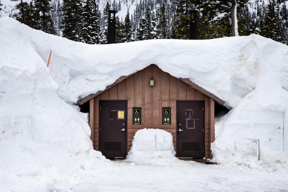 Snow piles up at the Ray Benson Sno-Park near Santiam Pass on March 30.