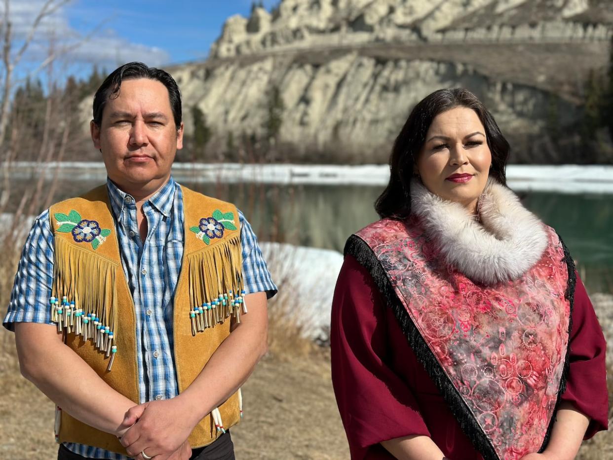 Chief Sean Smith of the Kwanlin Dün First Nation and Chief Amanda Leas of the Ta'an Kwäch'än Council in Whitehorse on Monday. The 2 hope that ground searches at the sites of Yukon Hall and Coudert Hall in the city will offer a better understanding of the history and legacy of residential schools in the territory.     (Cheryl Kawaja/CBC - image credit)