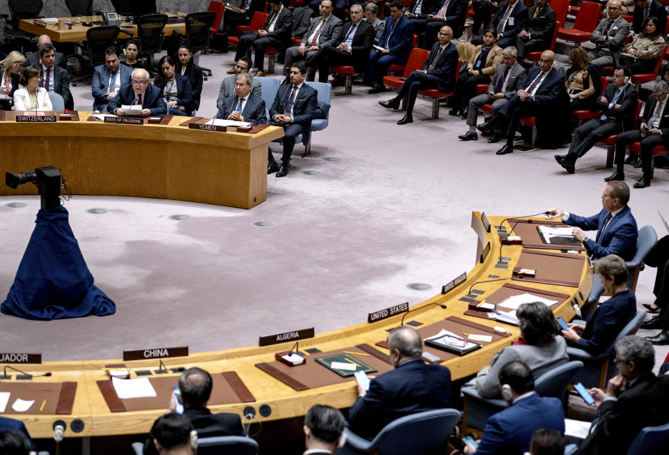 Palestinian Ambassador to the United Nations Riyad Mansour, top left, addresses United Nations Security Council at U.N. headquarters, Monday, March 25, 2024, after a vote that passed a cease-fire resolution in Gaza during the Muslim holy month of Ramadan, its first demand to halt fighting. Far right is Gilad Erdan, Permanent Representative of Israel to the United Nations. (AP Photo/Craig Ruttle)