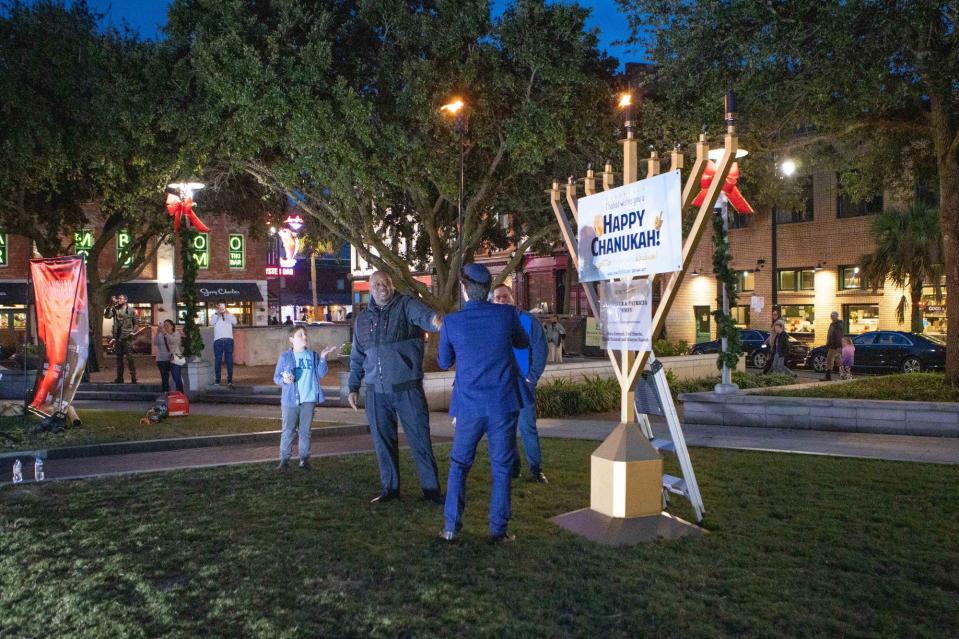 (L-R) Savannah Mayor Van Johnson joins Chabad of Savannah's Rabbi Zalman Revson to light the menorah during Hanukkah in the Square. This ceremony marks the start of the eight day celebration of the Festival of Lights.
