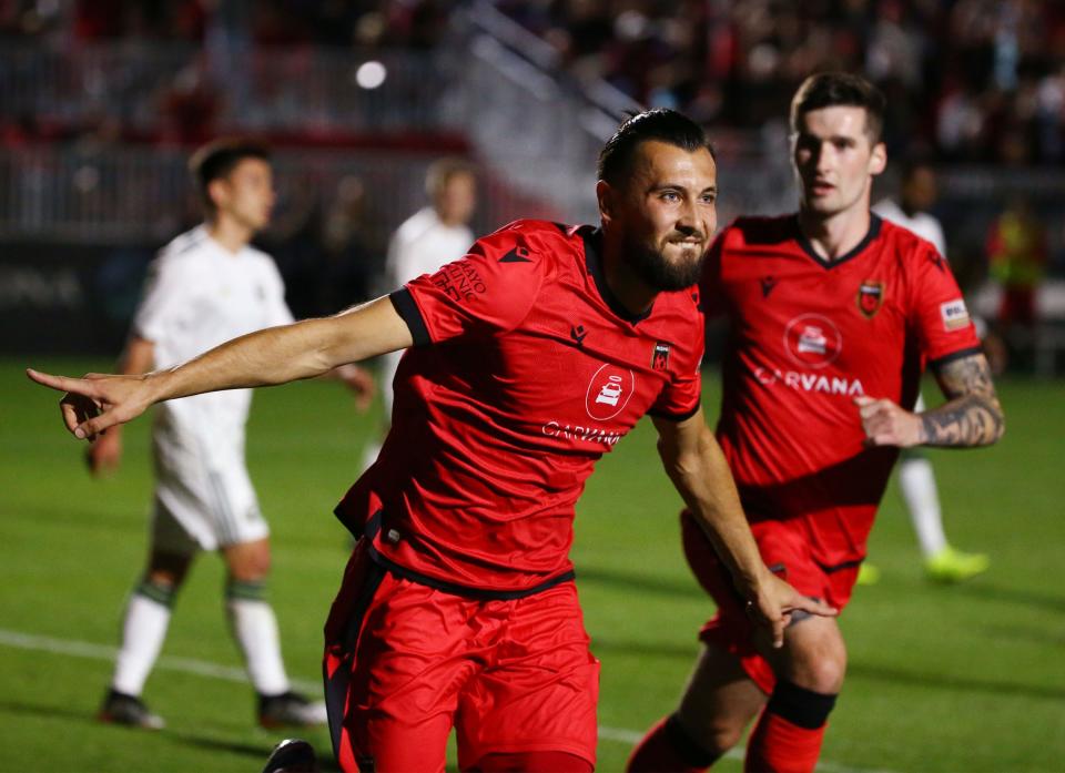 Phoenix Rising FC forward Rufat Dadashov reacts after scoring a goal in the 2020 season opener.