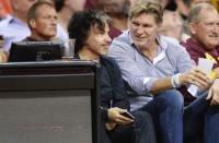 May 21, 2017; Cleveland, OH, USA; Musician John Oates, left, watches during the first half in game three of the Eastern conference finals between the Cleveland Cavaliers and the Boston Celtics of the NBA Playoffs at Quicken Loans Arena. Mandatory Credit: Ken Blaze-USA TODAY Sports