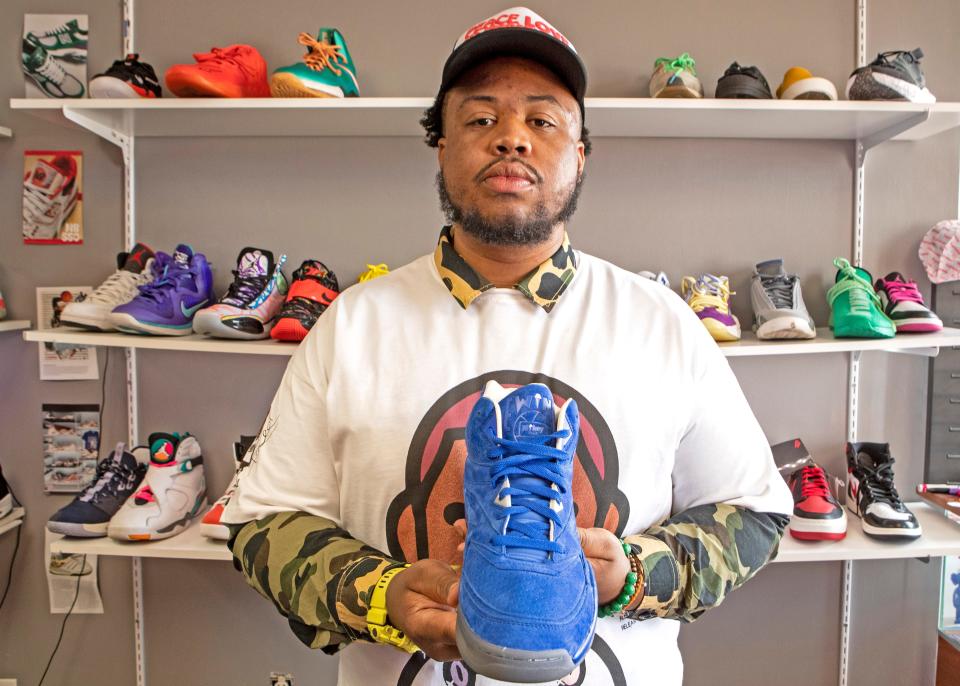 Ryan Johnson, 26, of Wilmington, holds up an unreleased Patrick Ewing sneaker at his 10kthelongway sneaker store in Newark, Monday, February 20, 2023. Johnson has been reselling shoes since he was a teen and is the creator of the SneakPeekConvention coming to Stubbs Early Education Center in Wilmington on Feb. 25.
(Photo: Benjamin Chambers/Delaware News Journal)