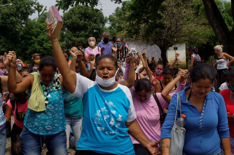 Relatives of inmates protest outside Los Llanos penitentiary after a riot erupted inside the prison leaving dozens of dead as the coronavirus disease (COVID-19) continues in Guanare