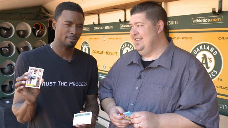 Dee Gordon opening 1992 Topps baseball cards. (Yahoo Sports)