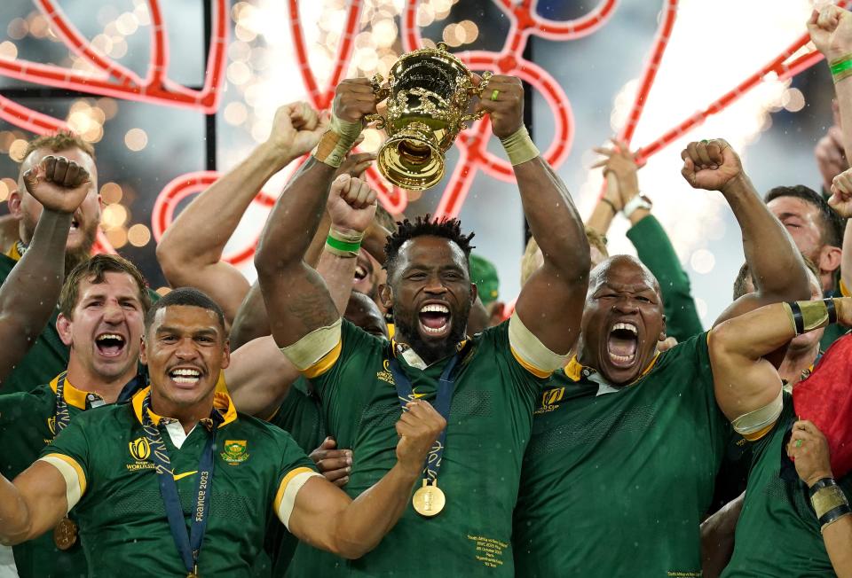 File photo dated 28-10-2023 of South Africa's Siya Kolisi lifting the Webb Ellis Cup. South Africa won the World Cup for a second successive time under their inspirational captain Siya Kolisi, retaining the title with a 12-11 victory over New Zealand in Paris. Issue date: Thursday December 14, 2023.