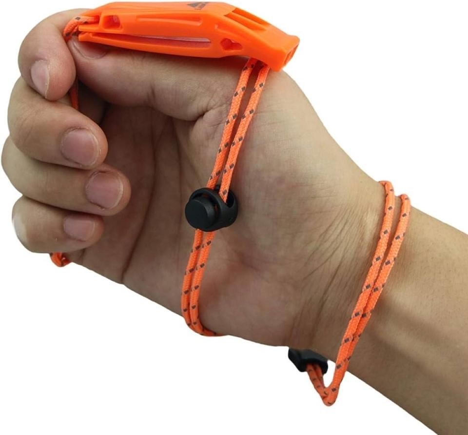 Orange emergency whistle