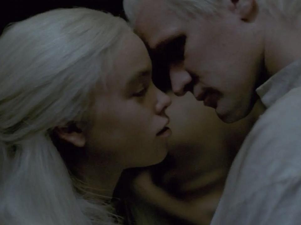 Milly Alcock as Rhaenyra Targaryen embracing Matt Smith as Daemon Targaryen.