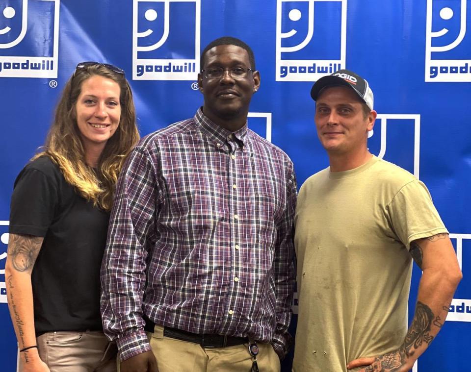 Phillip and Jennifer Hall, owners of P&J Labor Services, hired Brian Nelson, center, at the SafeHouse career fair. Nelson was a participant in SafeHouse’s HVAC training program.