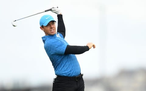 Northern Ireland's Rory McIlroy plays a shot on the first hole during the first round of the British Open golf Championships at Royal Portrush golf club in Northern Ireland on July 18, 2019 - Credit: Getty Images