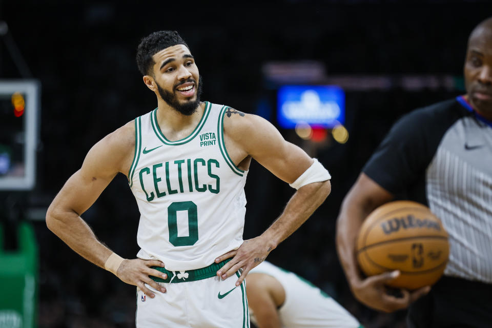 Boston, MA - January 10: Boston Celtics SF Jayson Tatum reacts to a call in the second half. The Celtics beat the Minnesota Timberwolves, 127-120, in overtime. (Photo by Erin Clark/The Boston Globe via Getty Images)