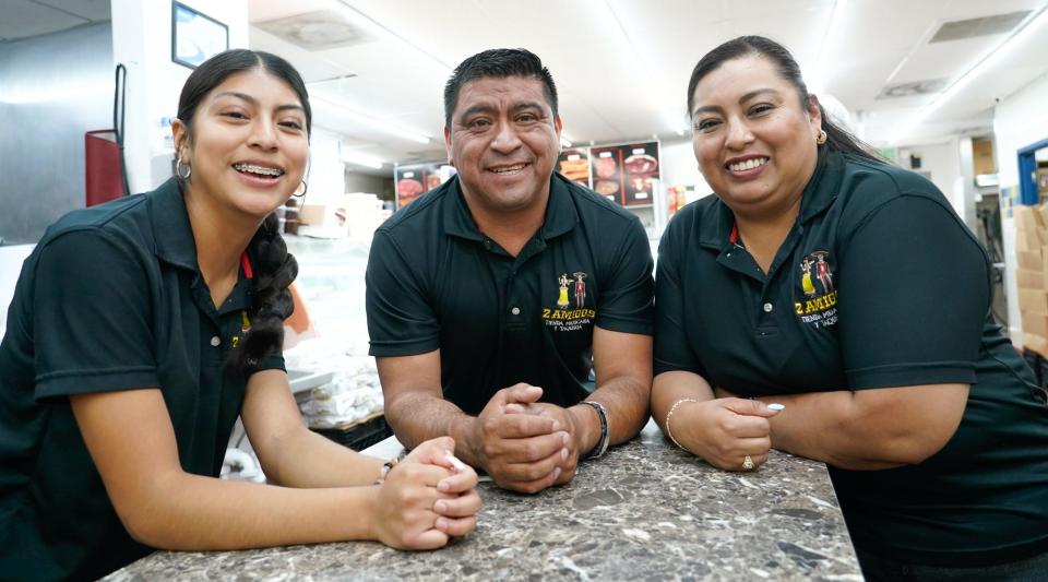 From left, Ximena Zarza-Diego,15, Joaquin Zarza, 44, Cecilia Diego, 42, on Monday, July 3, 2023, at Tienda 2 Amigos, a  family-run Mexican restaurant and grocery store in the Southeastern neighborhood of Indianapolis. Diego Zarza, 44, Cecilia Diego, 42, own the tienda and taqueria located on Southeastern Ave.