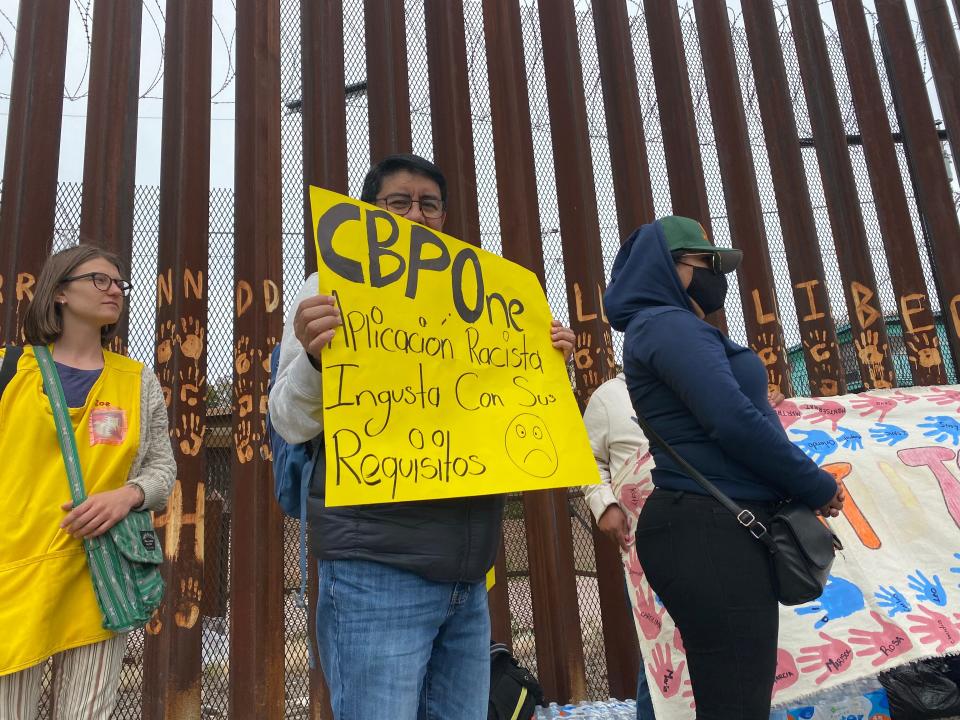 Migrants, advocates and faith leaders gather near the Dennis DeConcini Port of Entry in Nogales, Sonora, to commemorate the third anniversary of Title 42 on March 21, 2023.