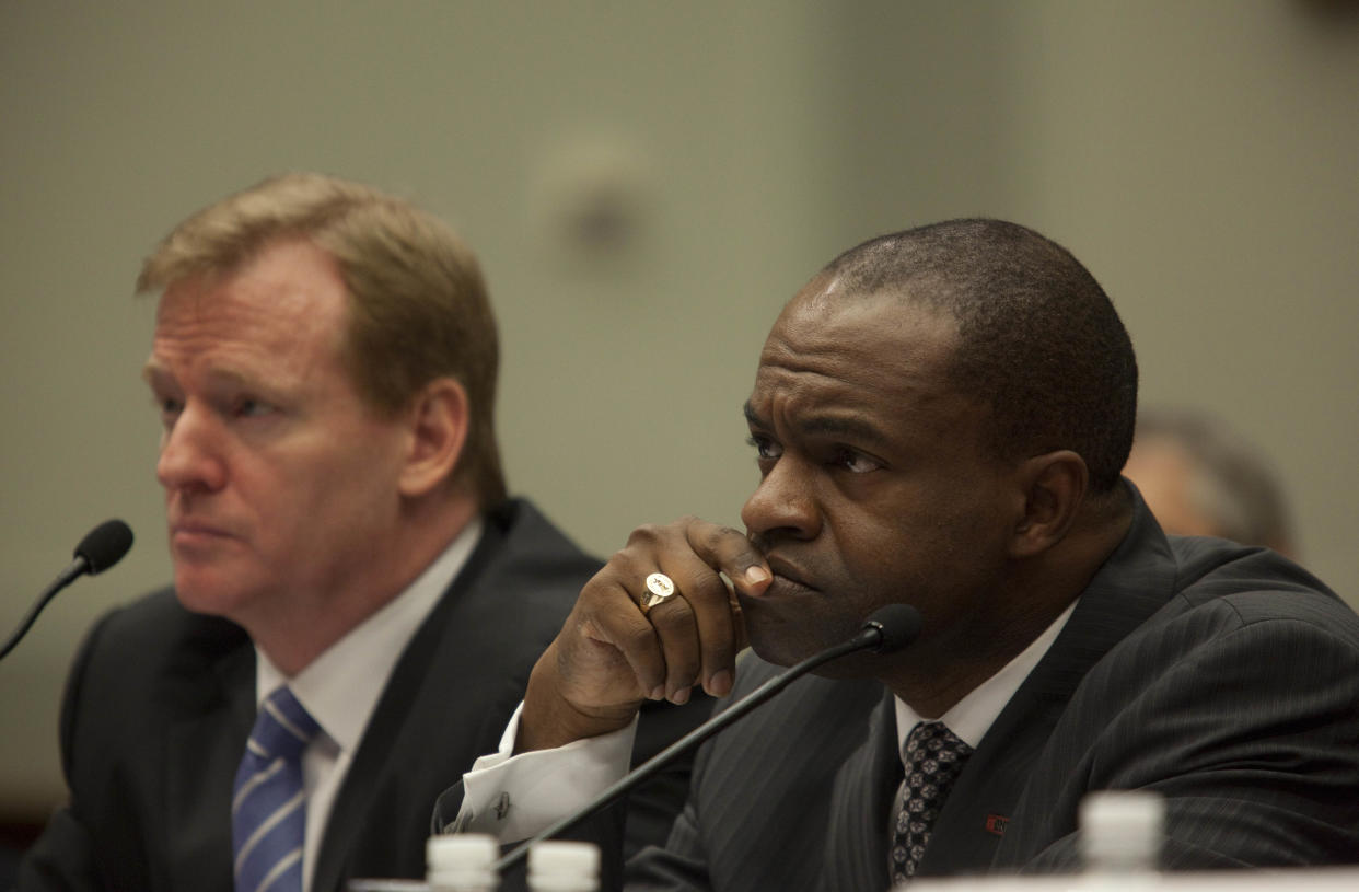 DeMaurice Smith (right) was instrumental in striking multiple new collective bargaining agreements with the NFL as executive director of the NFL Players Association for the last 14 years. (Getty Images)