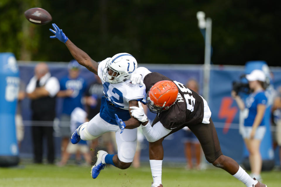 Indianapolis Colts defensive back Rolan Milligan (42) breaks up a pass toe Cleveland Browns tight end Demetrius Harris (88) during practice at the NFL team's football training camp in Westfield, Ind., Thursday, Aug. 15, 2019. (AP Photo/Michael Conroy)
