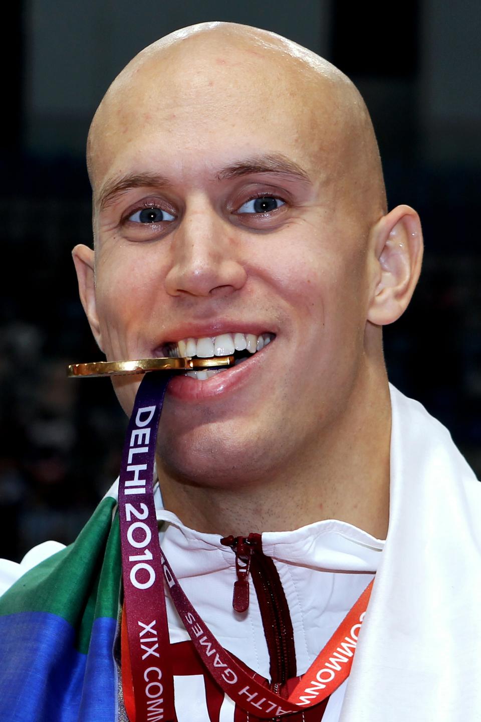 DELHI, INDIA - OCTOBER 07: Brent Hayden of Canada poses with the gold medal during the medal ceremony for the Men's 100m Freestyle Final at the Dr. S.P. Mukherjee Aquatics Complex during day four of the Delhi 2010 Commonwealth Games on October 7, 2010 in Delhi, India. (Photo by Ian Walton/Getty Images)