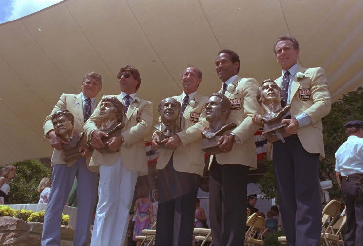 O.J. Simpson, second from right, could still attend future Hall of Fame events. (AP)