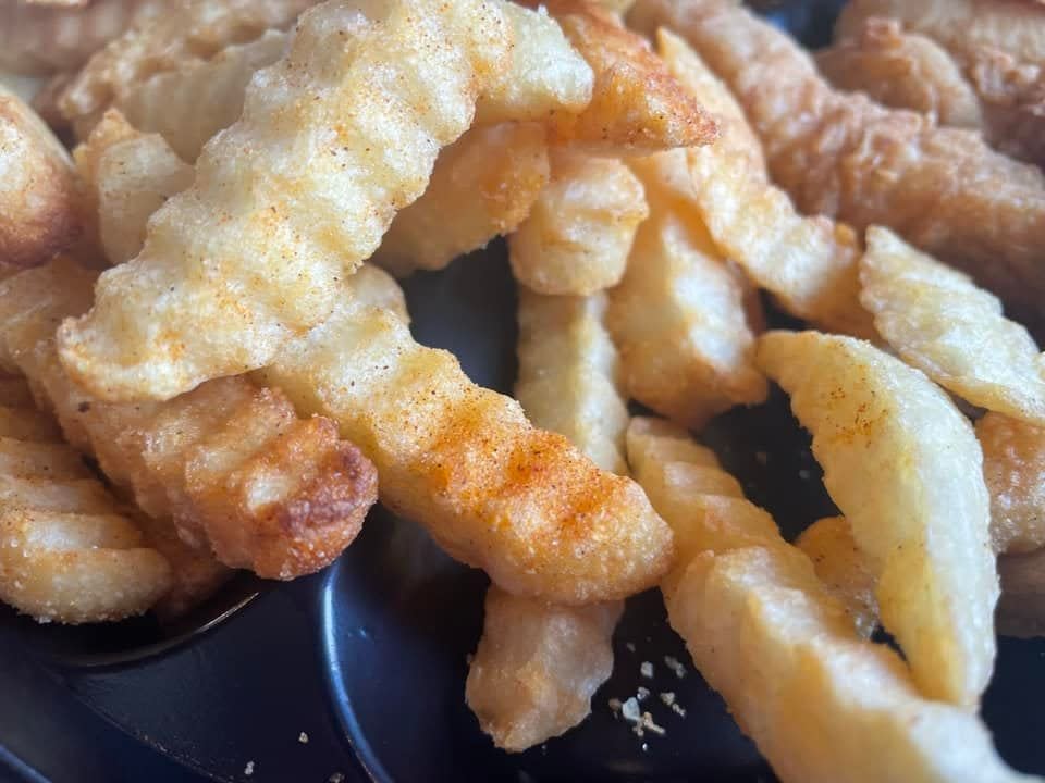 A close up shot of Zaxby's crinkle-cut fries