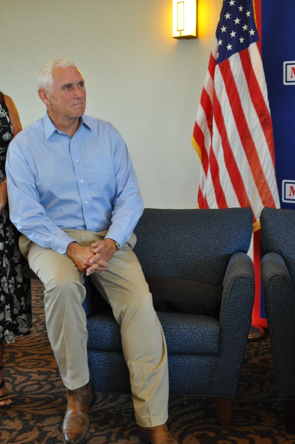 Former vice president and presidential candidate Mike Pence awaits a question at a town hall in Holstein, Iowa. Pence answered audience questions for more than an hour and then stayed and talked to every person who attended.