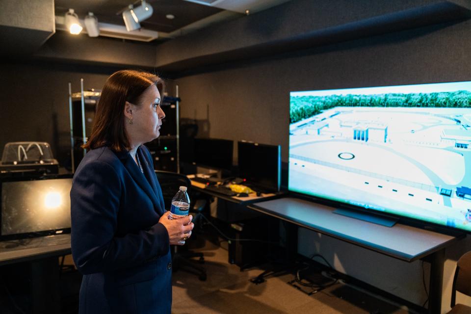 Kimberly Cheatle, the director of the Secret Service, shows a video of a proposed training facility that includes a full-scale replica of the White House inside a room in their headquarters in Washington, D.C.